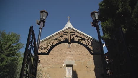 an entering low angle view of the 12th-century georgian orthodox church in the lurji monastery, or "blue church", in tbilisi georgia