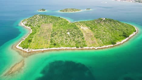 Aerial-view-over-Croatia's-Heart-Island,-also-known-as-'Galesnjak'-or-'Island-of-Love'-an-small,-heart-shaped-island-situated-in-the-Adriatic-Sea