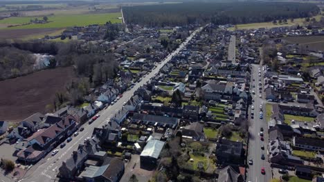 Aerial-view-of-the-Scottish-town-of-Edzell-on-a-sunny-spring-day,-Angus,-Scotland