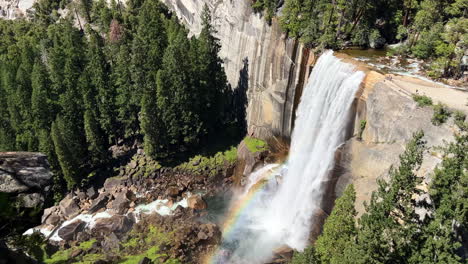 rainbow in the vernal fall on a sunny day in yosemite national park, california