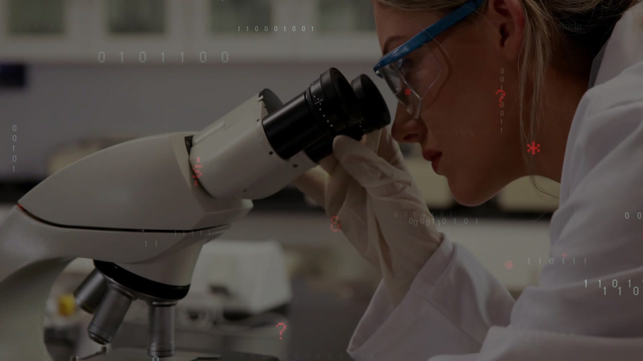 Woman researcher leaning into microscope, focusing and activating binary code overlays for research