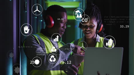 animation of data processing over african american male and female engineers working at server room