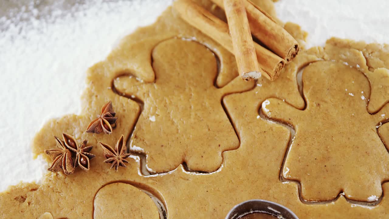 Flattened dough cut with a cookie cutter 4k