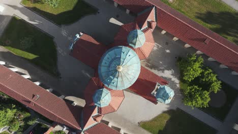 Top-Down-Aerial-View,-Dome-of-Church-of-Our-Lady-Victorious,-Bílá-Hora,-Prague,-Czech-Republic-on-Sunny-Summer-Day