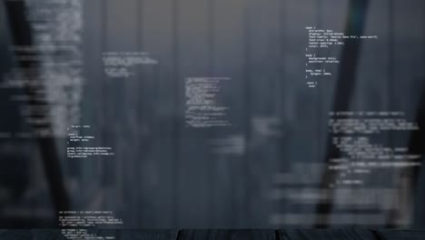 Animation of red mandala pattern and programming language over cityscape in background