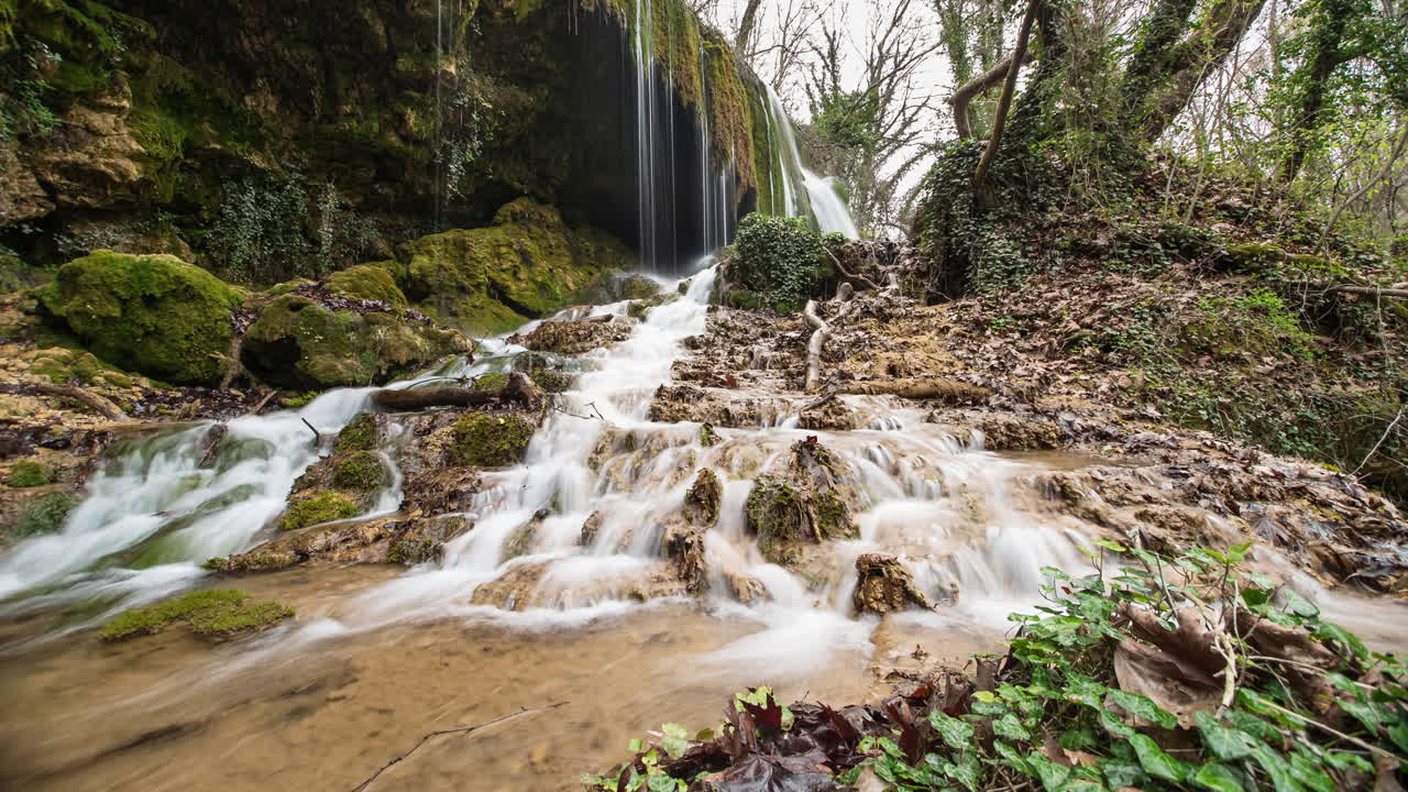 Moving Timelapse small Waterfalls mountain forest stream river Summer pan left