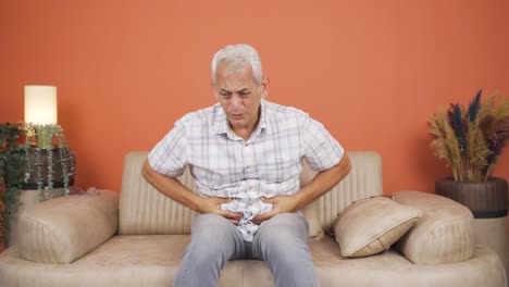 hombre con dolor de estómago.