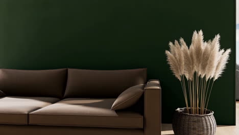 modern living room interior with brown sofa and pampas grass plant against a dark green wall