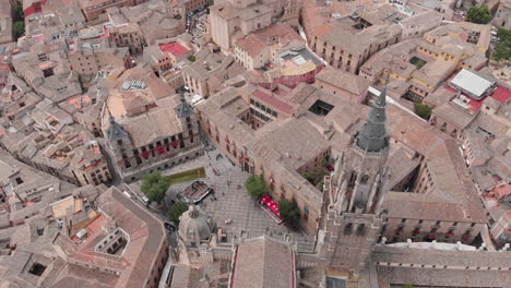 aerial view, tilt up revealing the toledo cathedral, toledo, spain