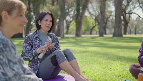 women friends relaxing in a park