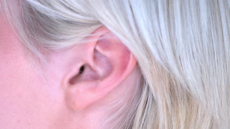 closeup on ear of young woman