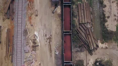 Aerial-View-Of-Open-Hopper-Cars-With-Coal-Moving-In-The-Railway-At-Paradip-Port-In-India