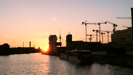 silhouetted riverside in berlin