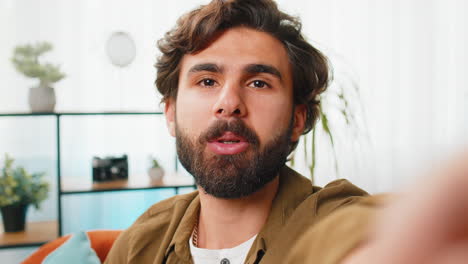 pov view man blogger taking selfie on smartphone video call online conversation recording stories