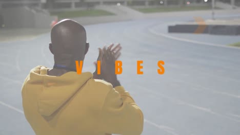 animation of vibes text over african american male coach clapping