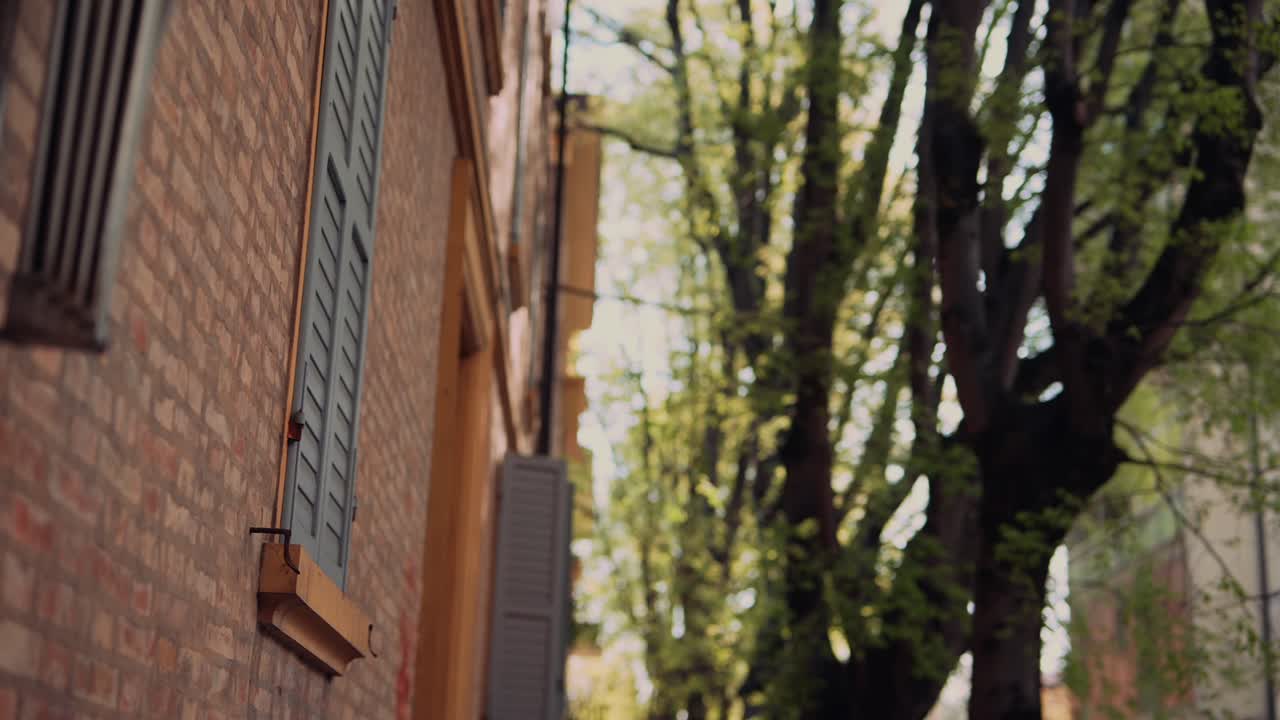 Old Brick Building with Shutters