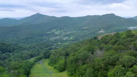 lush scenery of the appalachian mountain slopes in the summertime, aerial