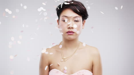 woman in pink dress with confetti