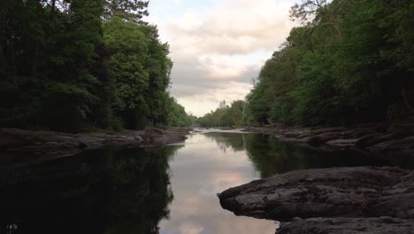 a gentle river during a summer evening