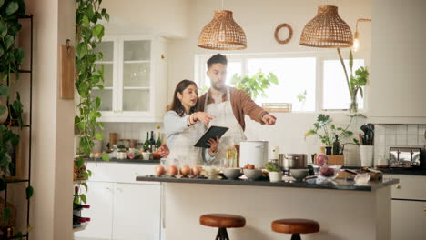 couple cooking together using a recipe app