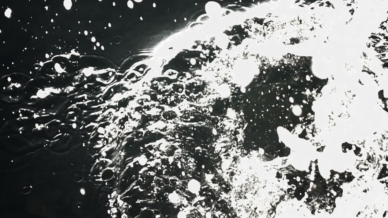 The stone falls in water. Slow Motion