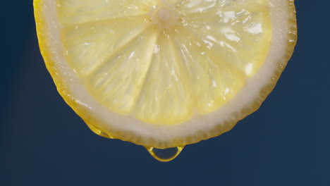 detail of lemon slice filmed in studio in slow motion