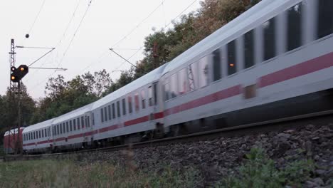 Train-passes-by-at-a-german-railway-track-in-Guenzburg,-Germany