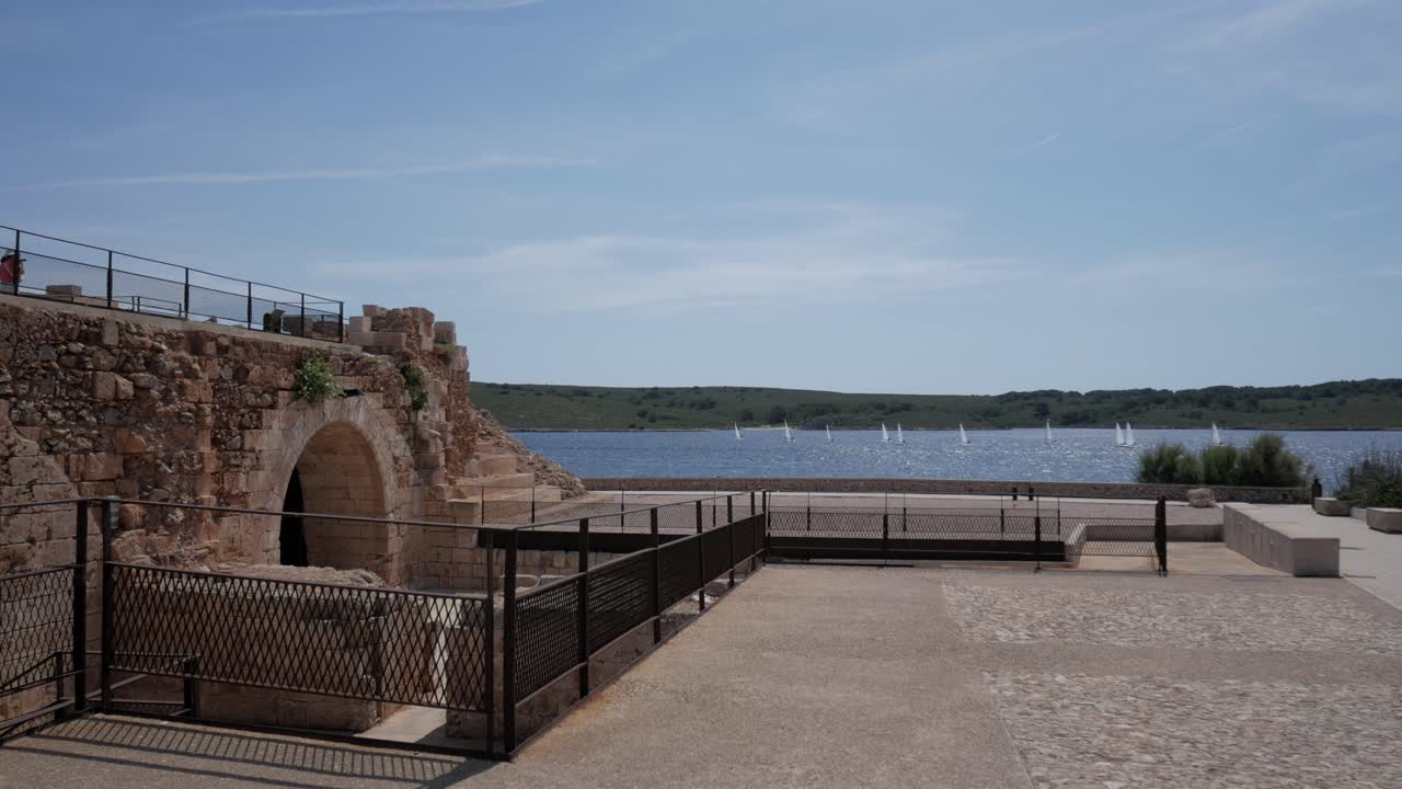 Castell De San Antoni Fornells, showcasing ruins and serene water views