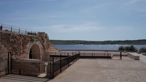castell de san antoni fornells, showcasing ruins and serene water views