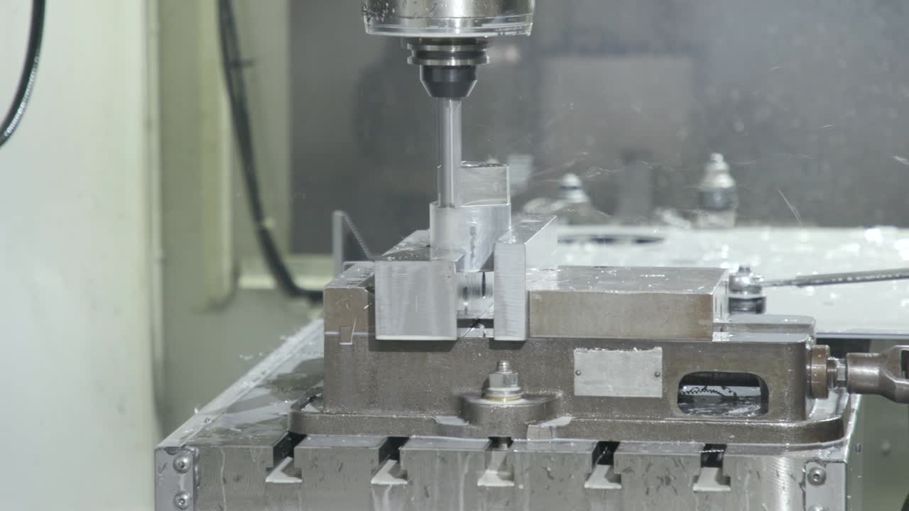 CNC Machine shaving metal down inside machine