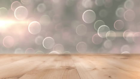 animación de puntos flotantes y mesa de madera sobre paparazzi