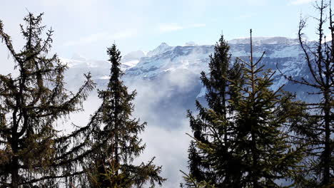 Prime-morning-mist-covering-Switzerland-alps-timelapse