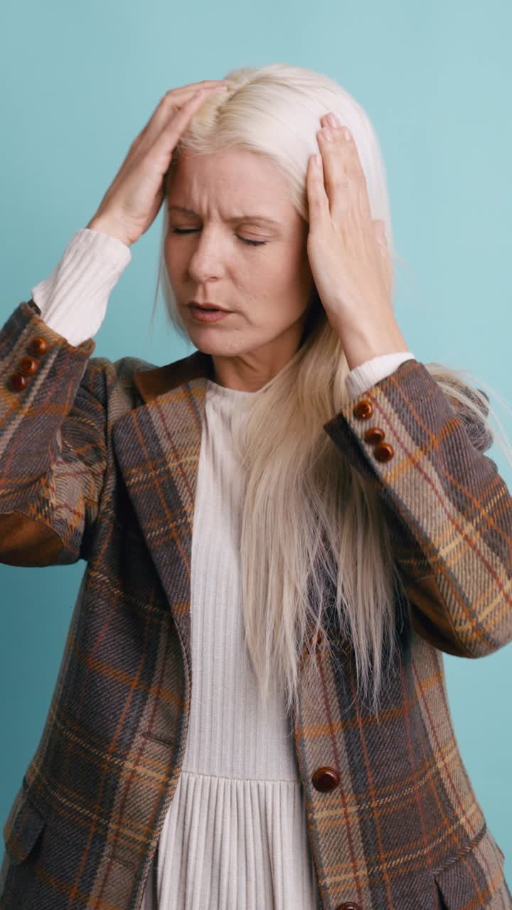 Blonde Woman Suffering from Headache and Stress