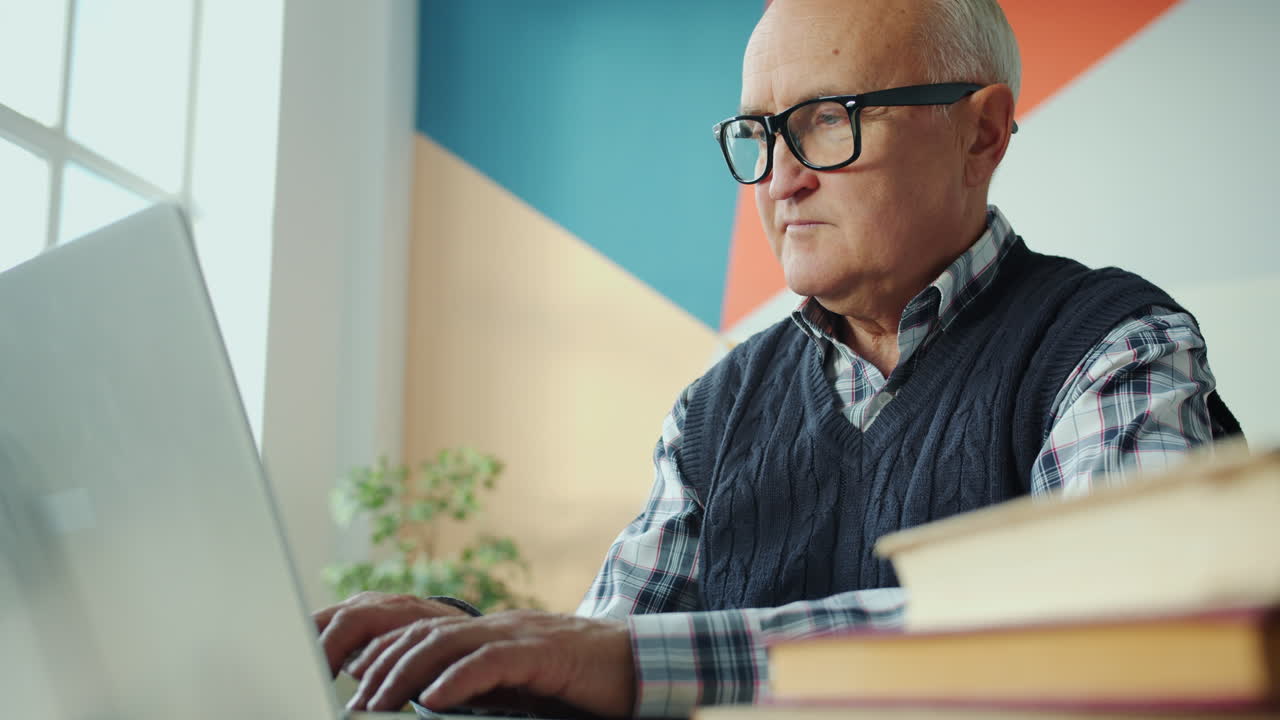 Senior Man Working on Laptop