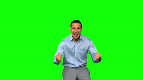 Cheerful-businessman-gesturing-on-green-screen