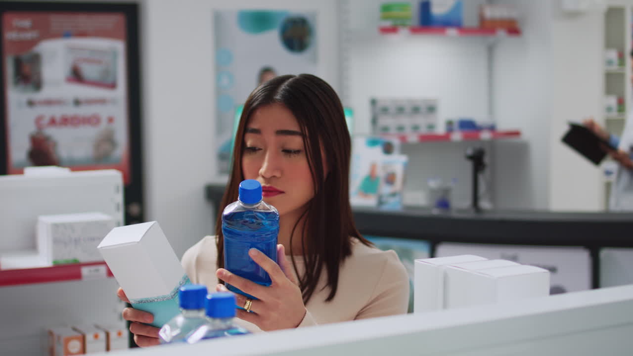 Woman shopping for medication in a pharmacy