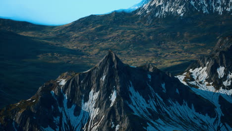 aerial view of a snowy mountain peak