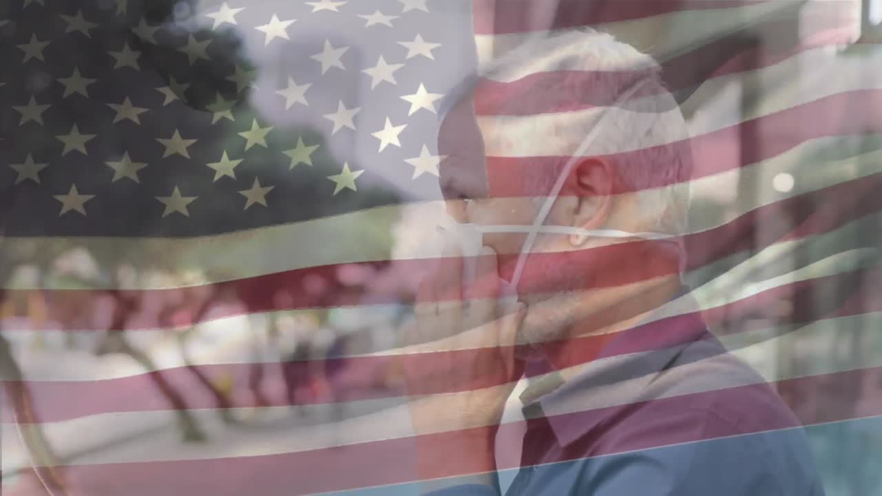 도시 거리에서 얼굴 마스크를 쓰고 있는 백인 남성 위에 흔들리는 미국 국기의 애니메이션