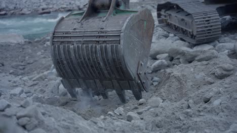 excavator operating near a river