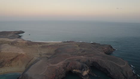 glowy-sky-above-a-calm-sea-in-Lanzarote