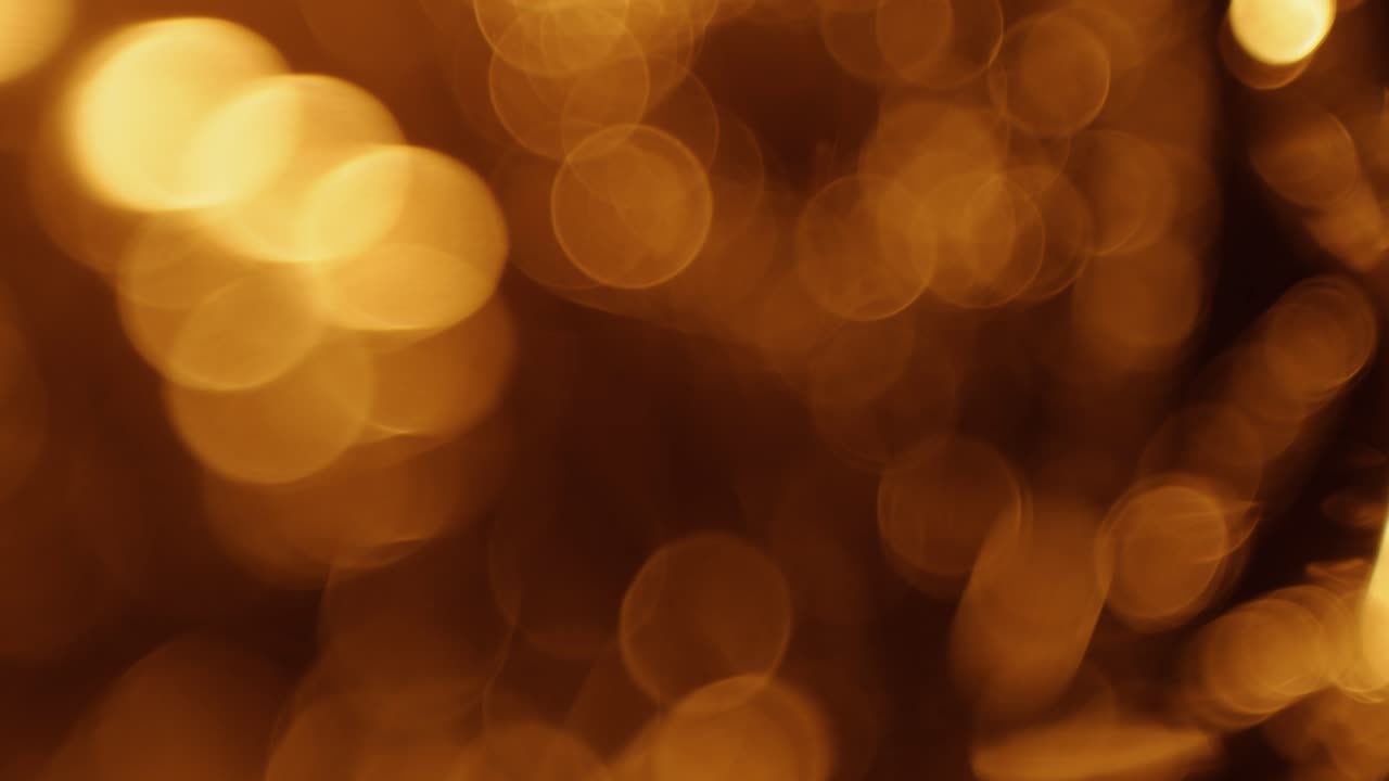 Sfondo con effetto bokeh dorato caldo