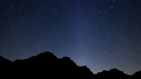 star trails over mountains