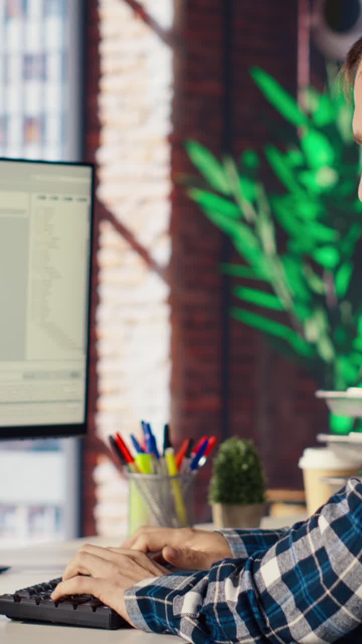 Vertical video Software developer at computer coding, creating software