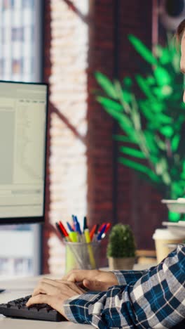 vertical video software developer at computer coding, creating software