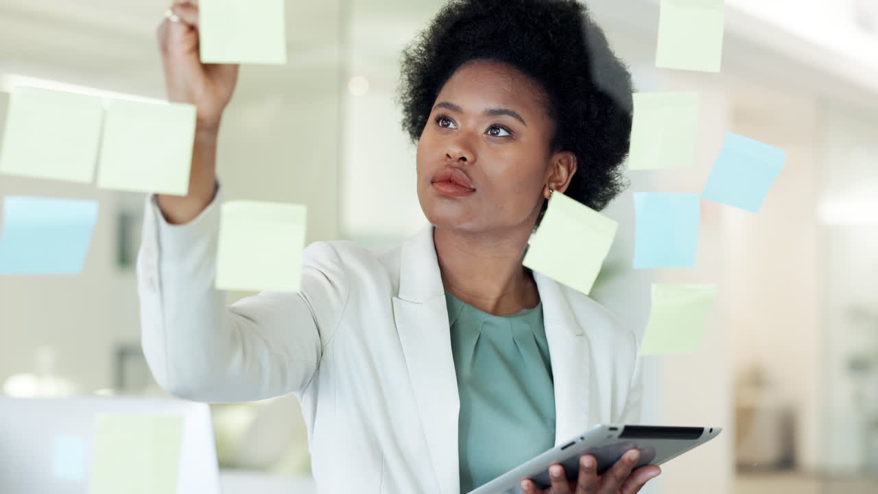 Project manager planning a strategy with an app