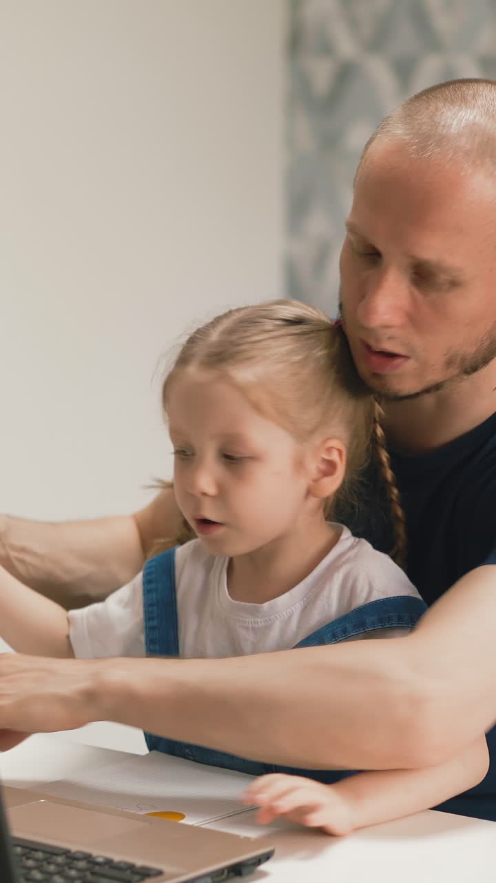 young father helps his little student kid learn, draw, smoothly circle contours, hugs her, distracts and looks pensively into distance through window, closeup