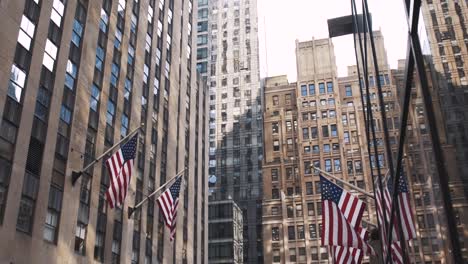 iconic new york city building with american flag