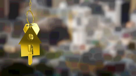 animation of gold house key fob and key, hanging in front of blurred city view