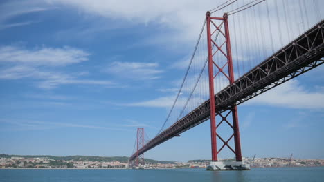 Driving-through-the-25th-de-April-in-Lissboa,-Portugal-looking-up