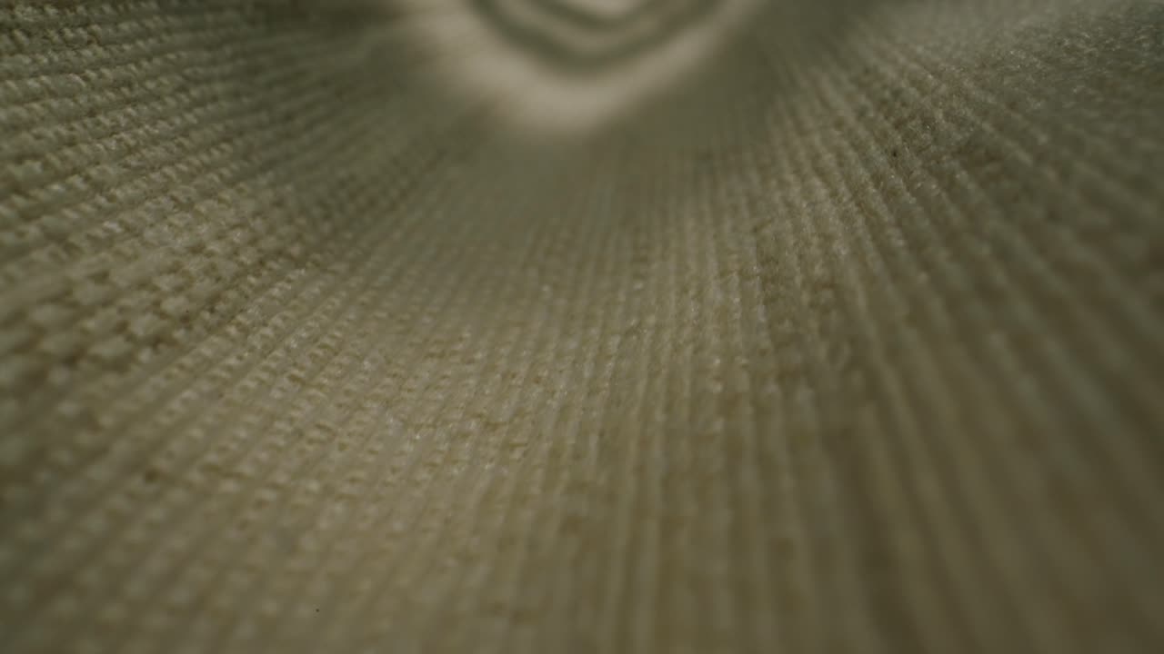 Closeup of an expertly tailored suit that beautifully showcases its sophisticated buttons and fine fabric texture